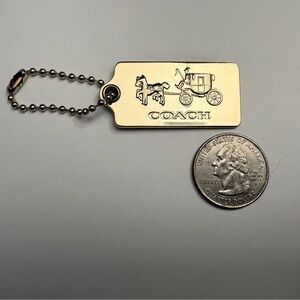 Coach Vintage Polished Gold-Tone Horse & Carriage Metal Hang Tag
